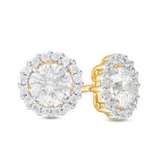 Express your affection with these dazzling diamond stud earrings. Crafted in 14K gold, each earring showcases a sparkling 3/8 ct. diamond wrapped in a shimmering frame of diamonds. Magnificent with 1 ct. t.w. of diamonds and a bright polished shine, these post earrings secure comfortably with friction backs. Diamond Halo Earrings For Anniversary, Anniversary Halo Cluster Earrings With Cubic Zirconia, Halo Diamond Earrings As Gift, Diamond Halo Earrings As Gift, Cubic Zirconia Cluster Earrings With Halo Design For Anniversary, Dazzling Cluster Earrings With Halo For Anniversary, Anniversary Halo Design Lab Grown Diamond Earrings, Fine Jewelry Halo Design Lab Grown Diamond Earrings, Fine Jewelry Halo Design Earrings With Lab Grown Diamonds