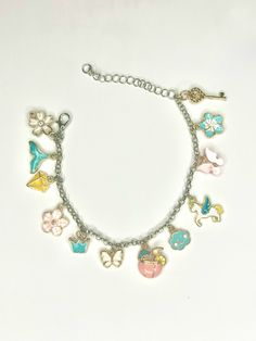 Spring/summer charm bracelet. Light pink and blue with pops of yellow Charm Bracelets, Favorite Jewelry, Etsy Accessories, Light Pink, Jewelry Bracelets, Handmade Items, Gift Card, Charm Bracelet, Charms