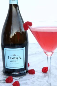 Sparkling Raspberry Martini | System of a Brown Raspberry Lemonade Vodka, Raspberry Martini Recipe, Raspberry Martini, Prosecco Drinks, Lamarca Prosecco, Prosecco Cocktails, Low Calorie Drinks, Cocktail Syrups