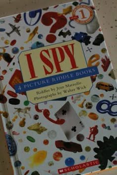 i spy picture riddle books are on the table