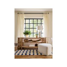 a living room with white curtains and a wooden bench in front of a window filled with potted plants