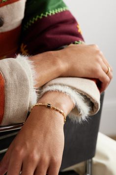 Suzanne Kalan's bracelet feels modern and minimal. Easy to wear with suiting to the office, it's been handmade in LA with slim gold links and accented by four encased black sapphire baguettes at the centre. Modern 14k Gold Bracelets For Everyday Luxury, Luxury 14k Yellow Gold Beaded Bracelets, Modern Yellow Gold Bracelet With Strap, Modern 14k Gold Bracelet For Everyday Luxury, Modern Gold Bracelet With Polished Finish For Everyday Luxury, Modern Gold Plated Bracelet, Modern Yellow Gold Bracelet With Jubilee Detail, Modern Tennis Bracelet As Gift, Modern Gold Tennis Bracelet For Everyday Luxury