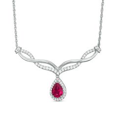 Classic and sophisticated, this fashion necklace flows with easy elegance. Crafted in sterling silver, this exquisite style shimmers with an 8.0 x 5.0mm pear-shaped lab-created bright red ruby dangle framed with sparkling petite lab-created white sapphires - all beneath an attractive chevron-shaped twist of polished and created sapphire-lined ribbons. Buffed to a brilliant luster, this design suspends centered along an 18.0-inch rope chain that secures with a spring-ring clasp. Prom Necklace, Prom Necklaces, Chevron Necklace, Luxe Jewelry, Peoples Jewellers, Classy Jewelry, Ruby Stone, Sapphire Stone, Red Ruby