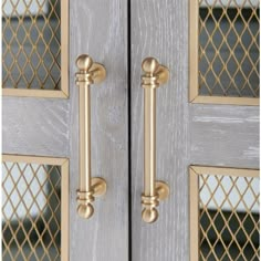 an image of a wooden door with metal handles