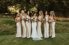 Bridal party in champagne gold satin bridesmaid dresses with the bride in a Halfpenny London wedding dress Ivory Silk Bridesmaid Dresses, Bridesmaid Dresses Satin Champagne, Gold Silk Bridesmaid Dresses, Cream Wedding Bridesmaid Dresses, Wedding Gold Bridesmaid Dresses, Bridal Party Champagne Dresses, Bridesmaid Gold Satin Dress, Chiffon And Satin Bridesmaid Dress, Soft Gold Bridesmaid Dresses