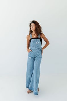 Final sale Elevate your style with these chic overalls. The wide leg and distressed denim create an effortlessly cool look that is sure to catch everyone's attention. A must-have for any fashionista looking to add a touch of edge to their wardrobe. Trust us, these overalls will be a valuable addition to your closet. Cool Look, Denim Overalls, Sweater Weather, Distressed Denim, Short Tops, Jumpsuit Dress, Dresses For Sale, Final Sale, Sweater Top