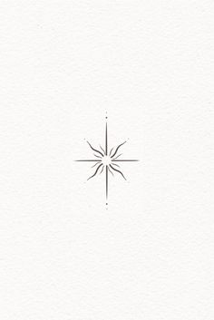 a white paper with a black and white drawing of a snowflake on it