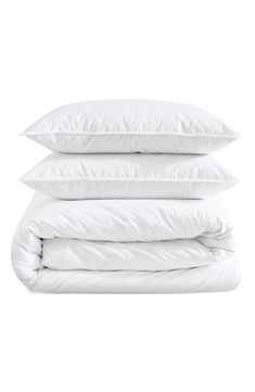 three pillows stacked on top of each other