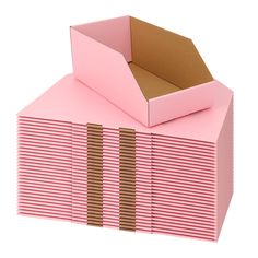 pink boxes stacked on top of each other with brown stripes in them and one open