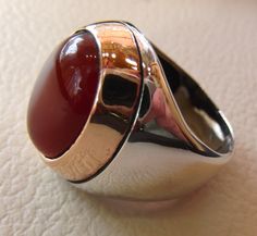 aqeeq red liver agate carnelian natural stone semi precious cabochon oval heavy man ring sterling silver bronze all sizes fast shipping Risk free Quality guarantee policy : If you are not satisfied with your item for any reason simply send it to us and you will get a replacement or refund . please write or choose your size with the order and we will size it for you . Our ring is handcrafted mostly with a few simple tools . but some methods are used in casting like lost wax method . sterling silv Polished Oval Cabochon Gemstones For Gift, Oval Cabochon Gemstones With Polished Finish For Gift, Carnelian Oval Cabochon Gemstone Jewelry, Oval Amber Agate Jewelry, Oval Polished Cabochons For Gifts, Polished Round Agate Jewelry, Formal Silver Carnelian Jewelry, Silver Round Cabochons With Polished Finish, Round Agate Jewelry With Polished Finish