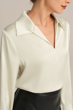 Experience the epitome of elegance with our Satin Blouse. Combining a loose fit with a smooth and comfortable fabric, this blouse is designed to make you feel effortlessly stylish. With long sleeves, a flattering V-neck, and a lapel collar, this piece exudes timeless charm. Material : 95%Polyester+5%Elastane.Elasticity : Low Stretchy.Sku : CL2156A23Package : 1*TopsCare instructions: Max wash temp: 30℃, No bleach, No tumble dry, Iron max 110℃, Wash dark colors separately, No PU ironing. Bodycon Floral Dress, Comfy Tops, Satin Blouse, Loose Blouse, Satin Silk, Long Sleeve Midi Dress, Blouse Dress, Lapel Collar, Guest Dresses