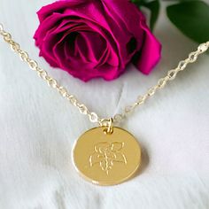 This Birth Month Flower Pendant Necklace is the ideal gift to celebrate a special birth month. With its elegant flower design, it is a thoughtful way to show your loved ones how much you care. Consider giving this unique piece of jewelry as a token of your affection. Material: 14K gold filled and plated Chain: 14K gold filled 16.5” Rolo chain Pendant: 14K gold plated hand stamped flower Lead and nickel free Delivered in a soft protective jewelry pouch and gift box Crafted in the USA Ships from M Valentine's Day Flower Pendant Jewelry For Anniversary, Valentine's Day Anniversary Flower Pendant Jewelry, 14k Gold Birth Flower Charm Necklace For Gift, 14k Gold Birth Flower Charm Necklace As Gift, Gold Flower-shaped Jewelry With Birthstone, Flower-shaped Valentine's Day Anniversary Jewelry, Mother's Day Gold Charm Necklace With Flower Charm, Mother's Day Gold Charm Necklace With Flower, Dainty Birth Flower Jewelry For Anniversary Gift