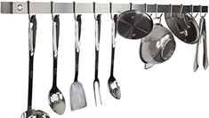 a rack with spoons and spatulas hanging from it