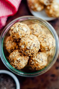 a glass bowl filled with oatmeal energy bites