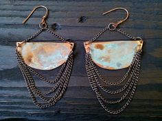 Vintage, beautiful earrings made with copper metal and silver chains. Copper has been oxidized with verdigris patina to give it an aged and vintage look (no two pairs of earrings look the same). Antique silver chains hang from each earring. Ear hooks are made by me using 18g 925 silver or copper wire. Mention at checkout. Super light weight. All my jewelry coated with protective wax finish to prevent tarnish. Lenght: 4 inches / 10cm *Shades of the patina vary due to the organic chemistry of the Patina Brass Rust Jewelry, Rust-colored Brass Jewelry With Patina, Rust-colored Patina Brass Jewelry, Copper Dangle Earrings With Patina, Copper Dangle Jewelry With Patina, Bohemian Copper Jewelry With Patina, Vintage Hand Forged Copper Earrings, Rust Colored Bohemian Metal Jewelry, Bohemian Rust-colored Metal Jewelry