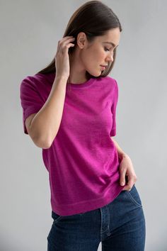 Our best-selling Crew-Neck Sweater Tee has a classic relaxed shape, with body length hitting at the high hip. It is knitted in semi-sheer luxury alpaca silk with self-yarn cover stitch details—the most elevated luxury tee you'll own. 70% Baby Alpaca 30% Silk Ultra lightweight fabric Dry clean only Made in Peru Relaxed Fit Merino Wool Tops For Work, Cashmere Crew Neck Knit Top For Work, Classic Crew Neck Cashmere T-shirt, Fine Knit Crew Neck Top With Relaxed Fit, Cashmere Crew Neck Top For Layering, Wool Crew Neck Top For Work, Classic Relaxed Fit Crew Neck Knit Top, Classic Crew Neck Knit Top With Relaxed Fit, Fine Knit Wool Crew Neck Top