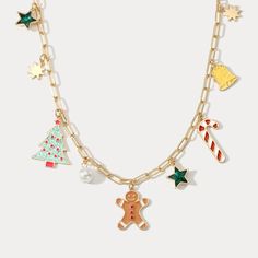 Celebrate the holidays with this festive Christmas Tree Gingerbread Man Necklace. This delicious-looking necklace features a gingerbread man hanging from a tree, making a perfect addition to any holiday ensemble. Spread the Christmas cheer with this fun and quirky accessory! DETAILS Plating: 18K Gold Materials: 18K Gold on Brass, Dripping oil,  Imitation Pearl, Zircon Measurements :   Length: 15.75"(40cm) + Extender: 1.97"(5.0cm) Weight: 21g Christmas Charm Necklace, Christmas Jewerly, Christmas Tree Gingerbread, Burr Basket, Man Necklace, Cinderella Pumpkin, Unique Gift Wrapping, Christmas Necklace, Butterfly Gifts