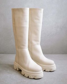 Functionality meets style in this tall boot with a chunky sole and slight elevation.    product type: high boot    platform height: 5 cm    material: leather    color: off-white    made in spain White Leather Knee-high Boots With Round Toe, Chic Cream Boots With Lug Sole, White Leather Knee-high Boots Medium Width, Lug Boots, High Leather Boots, Tall Boot, Sustainable Fashion Brands, Stylish Boots, Beautiful Boots