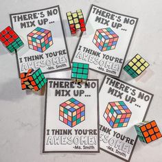 there are six stickers that say i think you're awesome and have rubix cubes on them