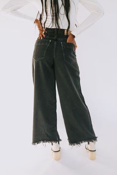 Details High-rise Exaggerated wide-leg fit Raw bottom hem Five-pocket style Button-front closure Denim jeans Sizing Approximate measurements: SIZE LENGTH INSEAM WAIST 24 40" 29" 24" 25 41" 30" 25" 26 41" 30" 26" 27 41.5" 30" 27" 28 42" 30.5" 28" 29 42.5" 31" 29" 30 42.5" 31" 30" 31 43" 31.5" 32" 32" 43" 31.5" 34" Fits true to size Fabric has little to no stretch Models are 5'10 wearing 26 and 5’11” wearing 28 Material 60% Cotton 40% LyocellMachine wash cold separatelyOnly non-chlorine bleachTumb Slouchy Jeans, Free People Jeans, Black Denim Jeans, Old West, Denim Wash, Black Denim, A Button, Denim Jeans, Jeans Size