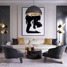 a living room filled with white furniture and art on the wall above two black chairs