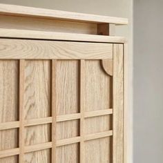 a close up of a wooden cabinet door