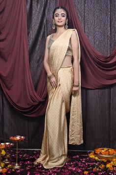 Beige pre-draped saree with polka dot printed base. Comes with mirrorwork embellished bead tasselled padded blouse. - Aza Fashions Pre-draped Wedding Saree With Zari Work, Fitted Pre-draped Saree With Zari Weaving For Reception, Pre-draped Traditional Saree For Wedding, Pre-draped Saree For Wedding And Festivals, Pre-draped Saree For Wedding And Festive Occasions, Festive Pre-draped Saree For Wedding, Wedding Saree With Draped Pallu, Festive Draped Tissue Silk Saree, Wedding Saree For Diwali