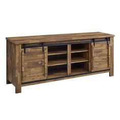 a wooden entertainment center with sliding doors and shelves on one side that has black metal handles