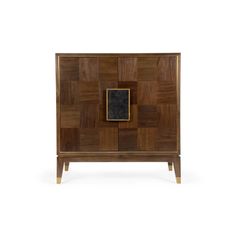 a wooden cabinet with two doors and a black square in the middle, on a white background