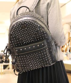 Combining studs and luxe-leather, this #MCM backpack is the ultimate style-statement... High School Backpacks, Rock N Roll Fashion, High School Backpack, Backpack Outfit, Hot Bags, Luggage Backpack