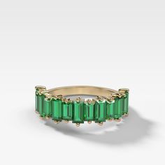 It's easy to lose yourself in the glitz of diamonds, but don't sleep on colored gems – these emeralds add much-needed color to your stack. Sandwich two diamond bands on either side of this Green Emerald Baguette Stacker for a modern look. 5mm at it's widest Halfway band available in rose, yellow and white gold (select size and metal at checkout) Questions? Want to modify this ring? CONTACT US Nervous About Buying Jewelry Online? READ THIS Made in the USA. All sales are final. All Good Stone piec Green Emerald Jewelry, Elegant Emerald Ring With Baguette Diamonds, Timeless Emerald Ring With Baguette Diamonds, Elegant Emerald Cut Emerald Ring With Baguette Diamonds, Yellow Gold Baguette Cut Emerald Ring, Elegant Emerald Cut Ring With Baguette Diamonds, Emerald Half Eternity Ring With Baguette Cut, Baguette Cut Emerald Ring For May Birthstone, Elegant Emerald Baguette Cut Ring