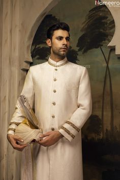 White Raw Silk Sets For Wedding, White Raw Silk Wedding Sets, White Raw Silk Kurta For Formal Occasions, Formal White Raw Silk Kurta, Raw Silk Sherwani With Intricate Embroidery For Wedding, Wedding Sherwani With Intricate Embroidery In Raw Silk, Wedding Sherwani In Raw Silk With Intricate Embroidery, Intricate Embroidered Raw Silk Sherwani For Wedding, White Raw Silk Nehru Jacket With Dabka