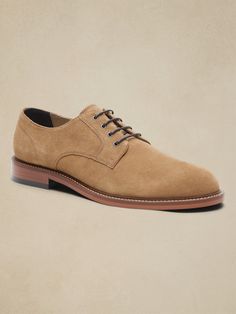 Modeled after traditional English styles, these oxford shoes offer a modern approach to more formal dressing, offering ultimate versatility with a luxurious suede construction in hues that work whether the occasion is more casual or true cocktail.  D Low-top Suede Oxfords With Suede Lining, Formal Suede Dress Shoes With Brogue Detailing, Suede Dress Shoes With Brogue Detailing, Elegant Suede Oxfords With Textured Sole, Business Wingtip Suede Dress Shoes, Suede Wingtip Oxfords For Business, Formal Suede Dress Shoes With Round Toe, Formal Suede Lace-up Shoes With Rubber Sole, Semi-formal Suede Wingtip Dress Shoes