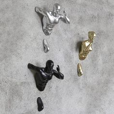 PRICES MAY VARY. Open your door to the world of decorating with these resin running wall art pieces. This set of three gold and black colored sculptures depict excited runners as they emerge from your wall. The durable and lightweight design makes it easy for you to hang these anywhere in your home or office. Amaze your guests with this athletic wall décor. This set has three runners and each runner comes with a distinct pose that will add character and personality to your room and makes a perfe Nike Home Decor, Athletic Room Decor, Tufted Wall Art, Mens Wall Decor, Fitness Wall Art, Marathon Gift, Woman Sculpture, Life Cast, Wall Office