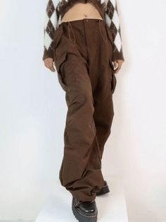 ⚡Buy 2023 Vintage Brown Baggy Parachute Cargo Pants Brown M under $44.00 in Pants at AnotherChill.com Online. Style: Casual/Street/Hip Pop/Punk/Y2K/Vintage. Fabric Content: Polyester Blend. Fit Type: Relax fit. : Step up your fashion game with these vintage-inspired parachute cargo pants. Perfect for festival seasons, these pants offer a relaxed fit and feature a drawstring detail at the waist and cuffs. Complete with functional pockets and a button zip fastening, they're a must-have addition to