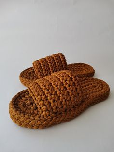 Indulge in warmth and elegance with our handcrafted crochet slippers. Crafted with care using high-quality, thicker yarn, these slippers feature a chunky design that not only adds to their charm but also provides an exceptional massaging effect for your feet. These slippers are your ideal companions for cozy nights at home. Whether you're snuggled up by the fireside, enjoying a cup of hot cocoa, or completing your winter ensemble, our slippers offer unrivaled comfort and allure. Our crochet slip Knit Slippers With Chunkey Yarn, Knit Slippers, Thick Yarn, Knitted Slippers, Handmade Christmas Gifts, Crochet Slippers, Hot Cocoa, Lithuania, Handmade Christmas