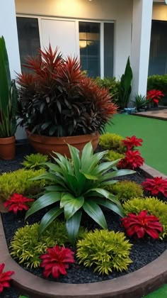 a flower garden in front of a building