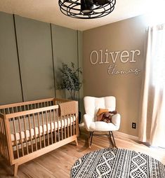 a baby's room with a crib and rocking chair