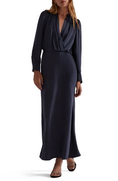 Elevate your look in this slinky satin maxi dress designed with a drapey, pleated surplice V-neck and long sleeves with button cuffs. 58" length (size Medium) Surplice V-neck Long sleeves with button cuffs Partially lined 100% polyester Dry clean or hand wash, dry flat Imported Silk Dress With Jacket, Navy Long Dress, Navy Gown, Wrap Dress Long Sleeve, Long Sleeve Bridesmaid Dress, Wrap Dress Long, Maxi Dress Designs, Dress With Jacket, Long Holiday