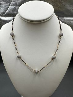 Single-line black diamond bead chain with CZ stone balls Handmade Jewelry  Silver-plated jewelry One gram of gold jewelry  For more products please visit  Globusfashions.com Official Website globusfashions.com 🌸 S H O P . M O R E . S T Y L E S  🌸 https://www.etsy.com/shop/Globusfashions Necklaces -  https://www.etsy.com/shop/Globusfashions?section_id=18712263 Bracelets - https://www.etsy.com/shop/Globusfashions?section_id=18969767 Pendant Sets - https://www.etsy.com/shop/Globusfashions?section Silver Jewelry With Pearl Chain For Celebration, Silver Pearl Chain Jewelry For Celebration, Festive Necklace With Round Black Beads, Celebration Jewelry With Faceted Round Beads, Celebration Jewelry With Faceted Beads, Festive Black Beaded Necklaces, Festive Black Beaded Necklace, Gold Necklaces With Black Beads For Party, Silver Jewelry With Black Beads For Wedding