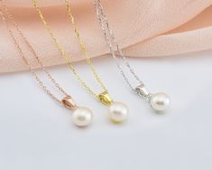 * Stunning handmade solid gold pearl necklace . 14K and 18K options are avaliable. Adorned with tiny beads of white zircon gemstone, used to emphasize the unique design. The necklace has an elegant design in every aspect. It is very stylish and convenient for daily use. You will not be able to take your eyes off the fascinating color of opal stone and the magnificent glitter of solid gold * ★Item Details ♥Made to Order ♥Gold Kt: 14K & 18K ♥Available Gold Color: Gold, Rose Gold, White Gold ♥P Akoya Pearl Pendant Jewelry For Wedding, Yellow Gold Pearl Pendant Jewelry For Wedding, Wedding Pearl Necklace With 14k Gold Pendant, Wedding Yellow Gold Jewelry With Pearl Pendant, Round Akoya Pearl Necklaces For Wedding, 14k Gold Pearl Necklace With Pearl Charm For Wedding, Round Akoya Pearl Necklace For Wedding, Gold Bridal Necklace With Akoya Pearl Pendant, 14k Gold Pearl Pendant Necklace For Wedding