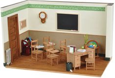 a dollhouse room with wooden furniture and a chalkboard on the wall