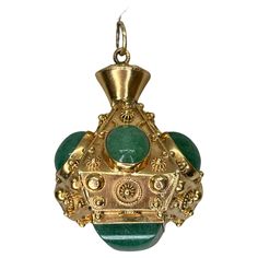 This vintage 18k gold Italian charm is encrusted with vivid green aventurine set among Etruscan Revival wirework and granulation. The ornate vintage piece was most likely first purchased at the Ponte Vecchio, a bridge in Florence famous for its jewelry shops and decadent baubles. The charm is oversized—the largest we’ve come across in this style. The unique 18k Gold Aventurine charm, fob, pendant presents timeless elegance of fine materials. Designed for the discerning collector who appreciates Collectible Gold Jade Jewelry, Luxury Green Engraved Jewelry, Luxury Engraved Green Jewelry, Gold Emerald Jewelry With Cabochon, Victorian Gold Emerald Jewelry, Victorian Emerald Jewelry In Yellow Gold, Victorian Yellow Gold Emerald Jewelry, Victorian Emerald Yellow Gold Jewelry, A Bridge