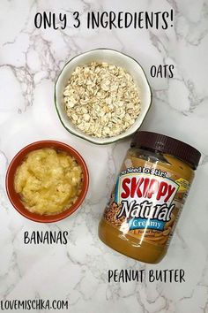 ingredients to make peanut butter oatmeal in bowls on a marble counter top