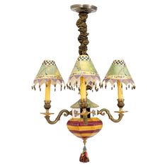 a chandelier with three lamps hanging from it's sides and two lights on each side