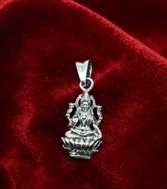 925 sterling silver handmade custom design vintage antique style Indian Hindu Goddess Laxmi pendant, this is a special leaf Ganesh design pendant, best wishes blessing gift for your special person, excellent jewelry from India. Metal-925 sterling silver. Item type-Pendant. Length-3.8 centimeters. Width-1.5 centimeters. Weight-4.250 grams. Stamped-925. Make excellent gifting and collectible pieces(gifts for birthdays, weddings, anniversaries, mother's day, fathers day, Christmas day,) We take abs Sterling Silver Large Pendant Jewelry For Festivals, Sterling Silver Jewelry With Large Pendant For Festivals, Engraved Temple Jewelry As A Gift, Sterling Silver Jewelry For Festivals And Gifts, Sterling Silver Jewelry For Festivals As A Gift, Festival Sterling Silver Jewelry In White Gold, Festival Jewelry In White Gold With Sterling Silver, Festival White Gold Sterling Silver Jewelry, Sterling Silver Pendant Necklace For Diwali