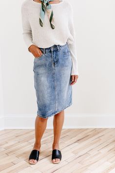 The 'Kyra' is another one of our very own exclusive denim skirts. Designed with everyday wear in mind, this skirt will pair well with just about any casual top in your wardrobe! This knee length denim skirt is 100% cotton and does not have stretch giving it a vintage vibe we love! Every woman needs a classic denim pencil skirt in her closet and this skirt is an excellent choice! Available in a classic light wash or statement black. 100% Cotton Machine Wash Cold Gentle Cycle Do Not Bleach Hang to Everyday Cotton Skirt For Fall, Chic Non-stretch Medium Wash Denim Skirt, Relaxed Fit Cotton Midi Denim Skirt, Casual Medium Wash Denim Midi Skirt, Non-stretch Cotton Skirt In Medium Wash, Medium Wash Non-stretch Cotton Skirt, Trendy Dark Wash Cotton Skirt, Trendy Lined Denim Skirt For Fall, Non-stretch Cotton Skirt