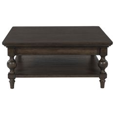 For those who appreciate a time-honored aesthetic with understated elegance, this coffee table brings home a timeless look. Its rich brown walnut finish merges seamlessly with a profiled top and traditional baluster turned legs for a richly classic appeal. And did we mention the spacious lower shelf to display your whatnots? | Signature Design by Ashley Veramond Coffee Table in Dark Brown | Wood | Nebraska Furniture Mart Cozy Living Rooms Coffee Tables, Dark Wood Coffee Table Living Room, Coffee Table Dark Wood, Dark Academia Coffee Table, Moody Coffee Table, Dark Coffee Table, Dark Brown Coffee Table, Wood Coffee Table Living Room, Square Wood Coffee Table