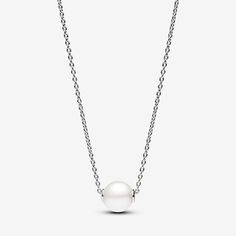 Elevate your style with our Treated Freshwater Cultured Pearl Collier Necklace. This necklace in sterling silver features an adjustable cable chain with a luminous treated freshwater cultured pearl pendant. A clear cubic zirconia by the clasp adds a touch of sparkle. This piece represents the fusion of classic and contemporary, making it a perfect choice for both casual and special occasions. Please note that each treated freshwater cultured pearl is unique and can vary in size and colour; norma Pandora Pearl Necklace, Pandora Pearl, Pandora Accessories, Pandora Necklace, Pandora Silver, Freshwater Cultured Pearls, Silver Pieces, Locket Necklace, Necklace Sizes