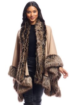 Lush, lavish Tipped Fox in a warm palette of rich Browns, elevated by Ivory, Tan and Taupe tipping, borders this incredibly versatile Camel knit shawl. Fluid, distinctive and voluminous, you'll love wrapping the Fur-Trimmed Shawl over suits, pants and dresses. Supple yet stable, a touch of Spandex ensures both stretch and recovery. Measuring a generous 51" across and 26" at center back, it's the cozy layer of luxury that drapes in a multitude of ways. Perfect for Fall weather, it's that extra layer that you'll add on the first cool days. Easy elegance personified, come Winter, you'll enjoy it indoors and outdoors as well, as a coat-topper! Elegant One-size Beige Outerwear, Beige Wool Shawl For Fall, Fall Beige Wool Shawl, Winter Beige Wool Shawl, Beige Wool Winter Shawl, Beige Winter Shawl Cape, Beige Wool Shawl For Winter, Beige Shawl Cape For Winter, Beige Cape Shawl For Fall